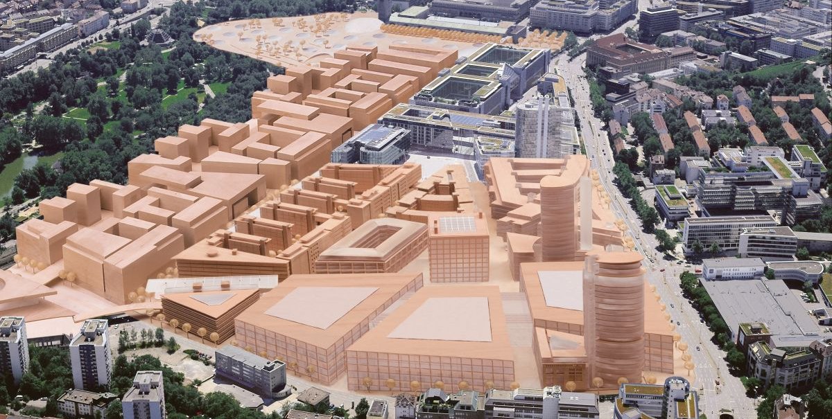 Luftaufnahme von Stuttgart mit visualisierten Bauprojekten. Die geplanten Gebäude sind in orange dargestellt, umgeben von bestehenden Strukturen und Grünflächen., © Aldinger und Wolf Luftaufnahme von Stuttgart mit visualisierten Bauprojekten. Die geplanten Gebäude sind in orange dargestellt, umgeben von bestehenden Strukturen und Grünflächen., © Aldinger und Wolf