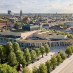 Aerial view of the Forum am Schlosspark in Ludwigsburg, surrounded by trees and urban architecture in sunny weather., © Stauch